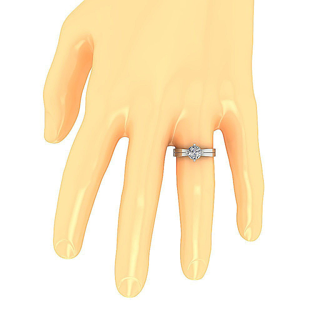 3.00 Carat tapered solitaire ring worn on a hand for a glamorous red-carpet look.