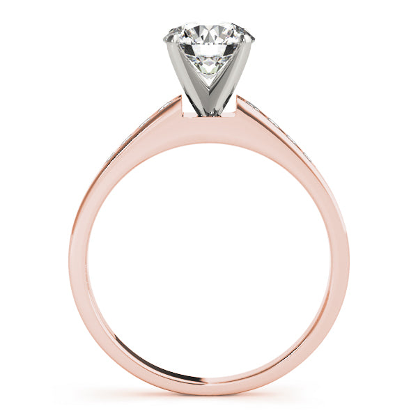Detailed side angle view of rose gold tapered diamond setting with brilliant sparkle