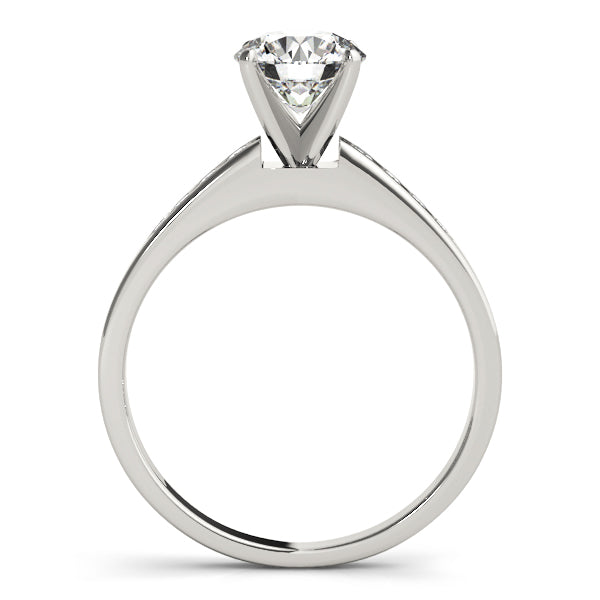 High-resolution side profile shot of white gold tapered channel set cathedral diamond ring