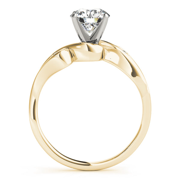 Direct side profile of a yellow gold bypass ring