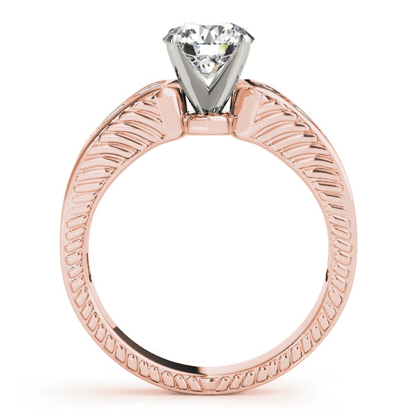Side view of rose gold milgrain border engagement ring.