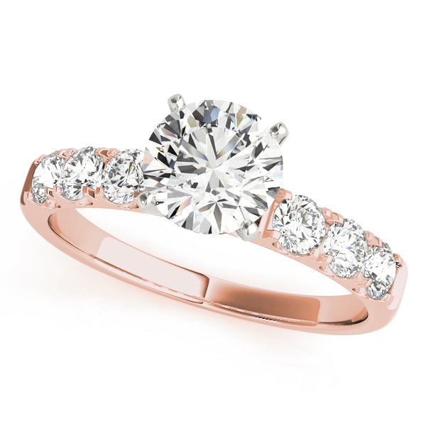 Rose gold round lab diamond ring with shared-prong band.