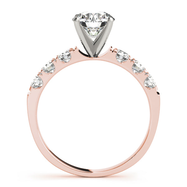 Side view of rose gold shared prong bridal ring.