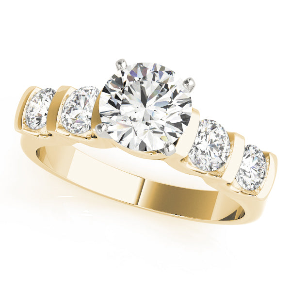 Yellow gold round lab diamond bar-set engagement ring.