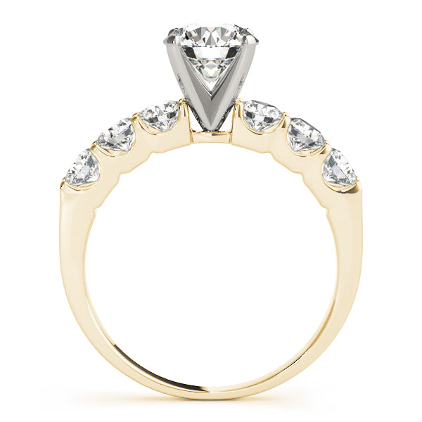 Side profile of yellow gold 14K scalloped diamond ring.