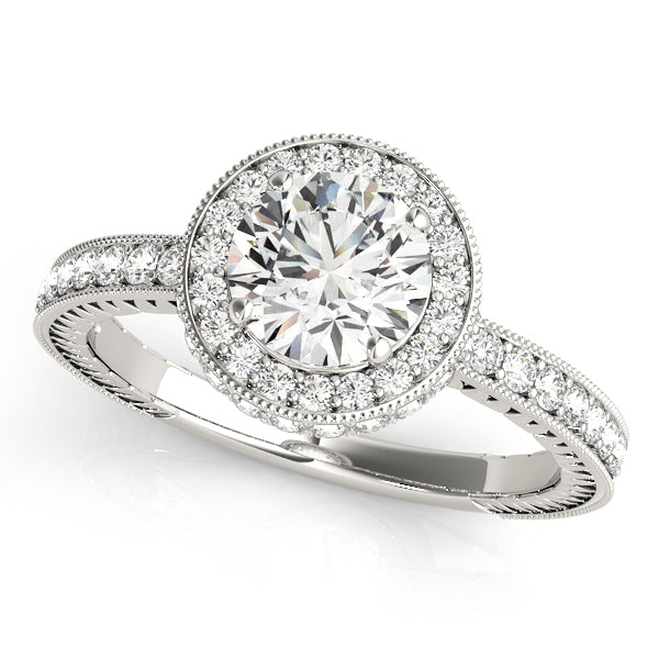 White gold vintage-inspired lab grown diamond halo bridal ring.
