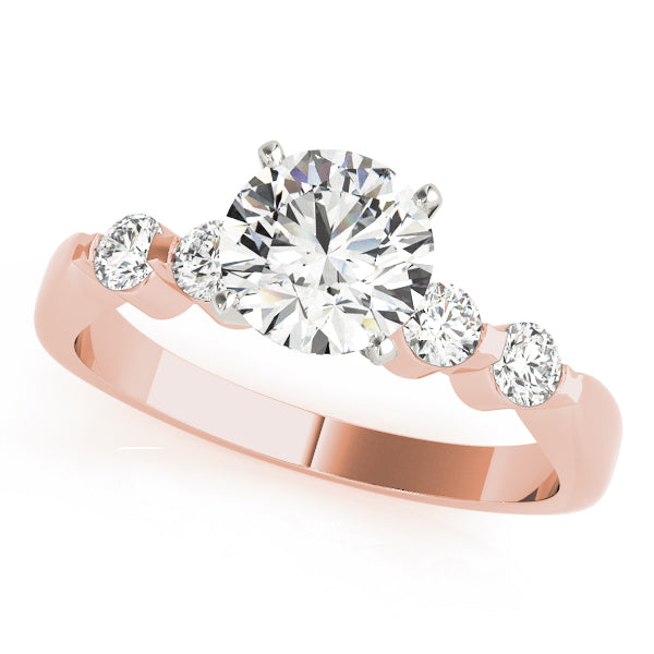 Romantic 14k rose gold wedding ring showcasing a brilliant round center diamond