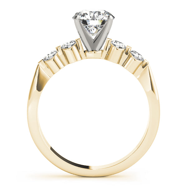 14k yellow gold engagement ring highlighting the secure four-prong head