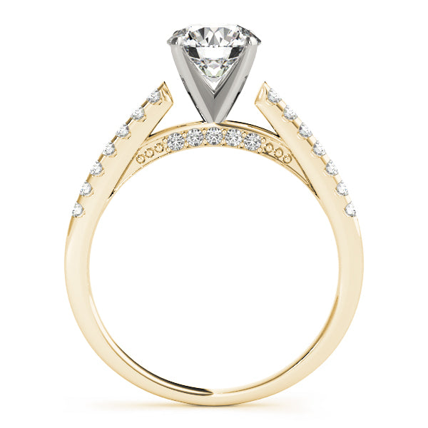 Side profile of yellow gold pavé diamond band.