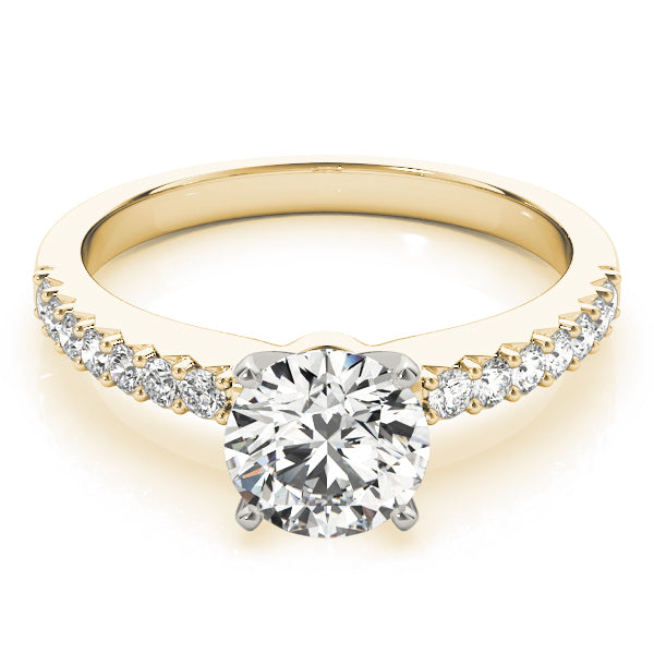 Round cut lab grown diamond cathedral ring in 14K yellow gold.