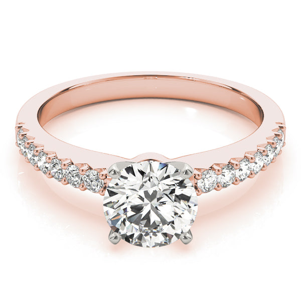 Brilliant round diamond engagement ring with pave band in 14K rose gold.