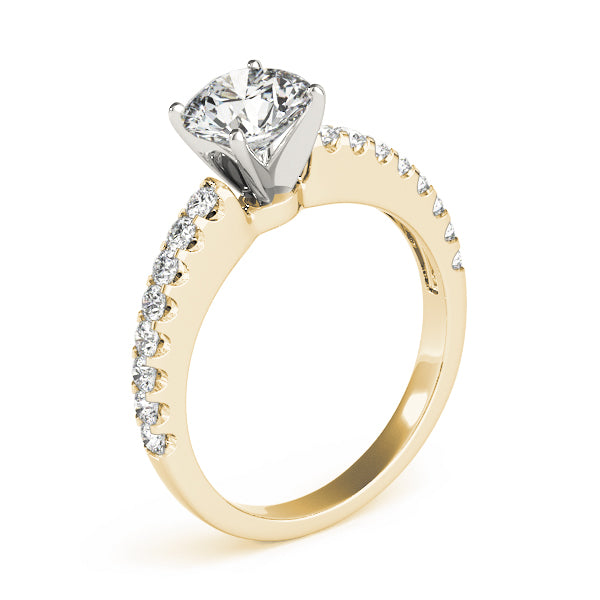 Direct side profile of yellow gold ring showing clean four-prong head.