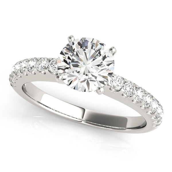 Top angled shot of classic round diamond pave band ring in white gold.