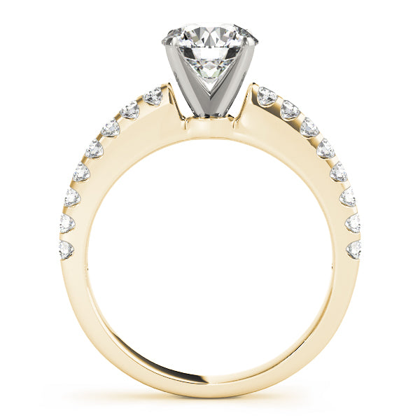 Direct side profile of yellow gold ring showing clean four-prong head.
