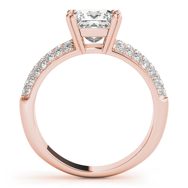 Side view of rose gold princess diamond ring illustrating the secure prong basket head.