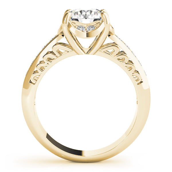 Side profile of 14k yellow gold round lab diamond halo ring with scrollwork shank.