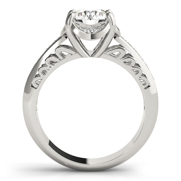 Side profile of 14k white gold round lab diamond halo engagement ring with filigree band.