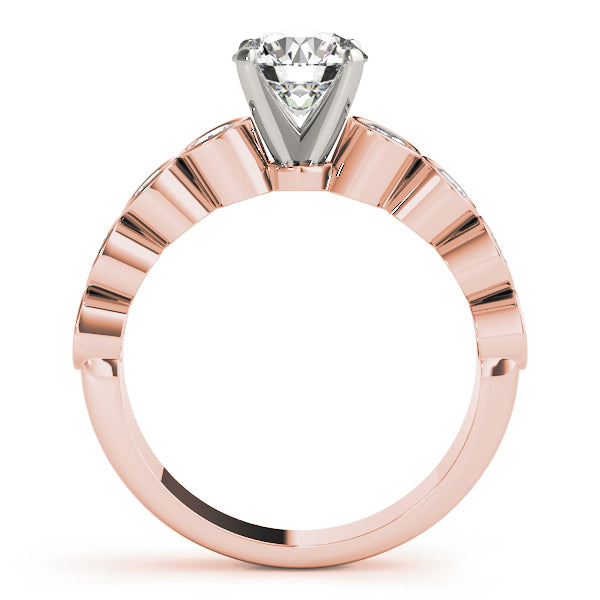 Side view of rose gold round diamond ring with elevated setting.