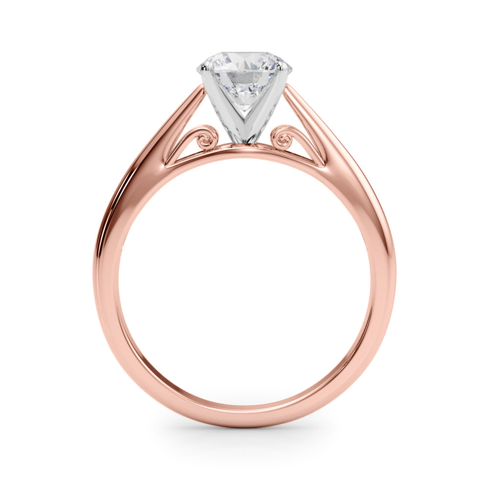 Side profile view of rose gold ring highlighting filigree basket detail.