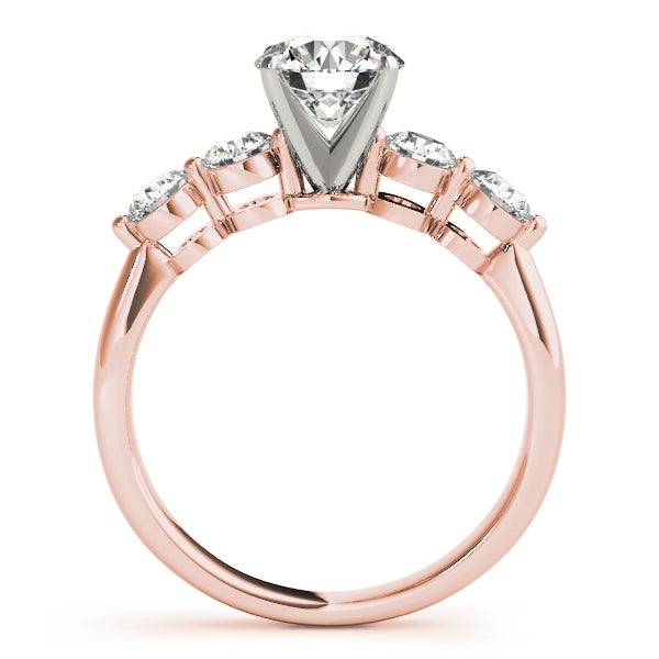 Side view of 14K rose gold engagement ring displaying graduating shared prong profile