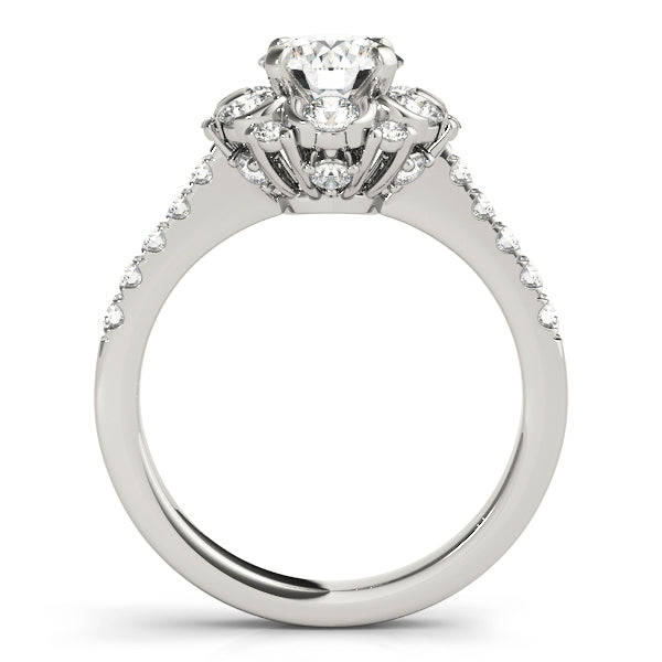 Front-angled view of a white gold vintage cathedral style ring