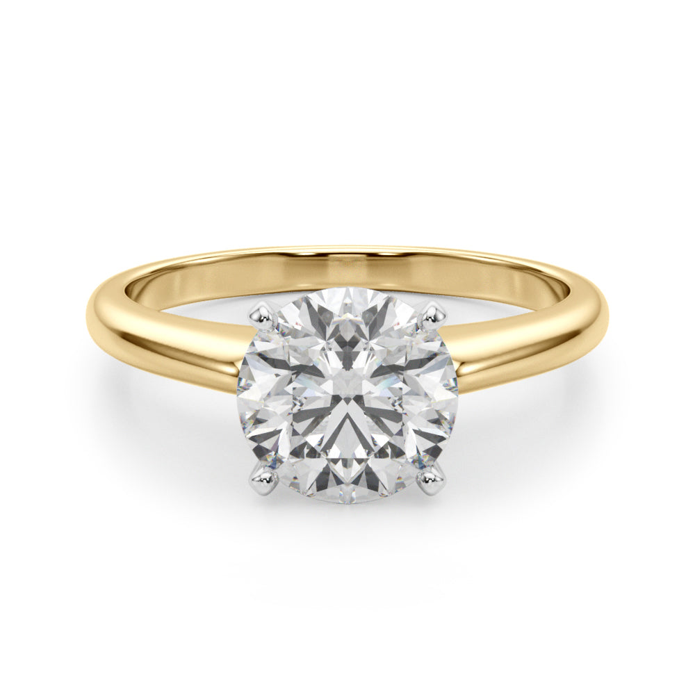 4-prong setting and high-set head of a yellow gold round diamond solitaire ring.