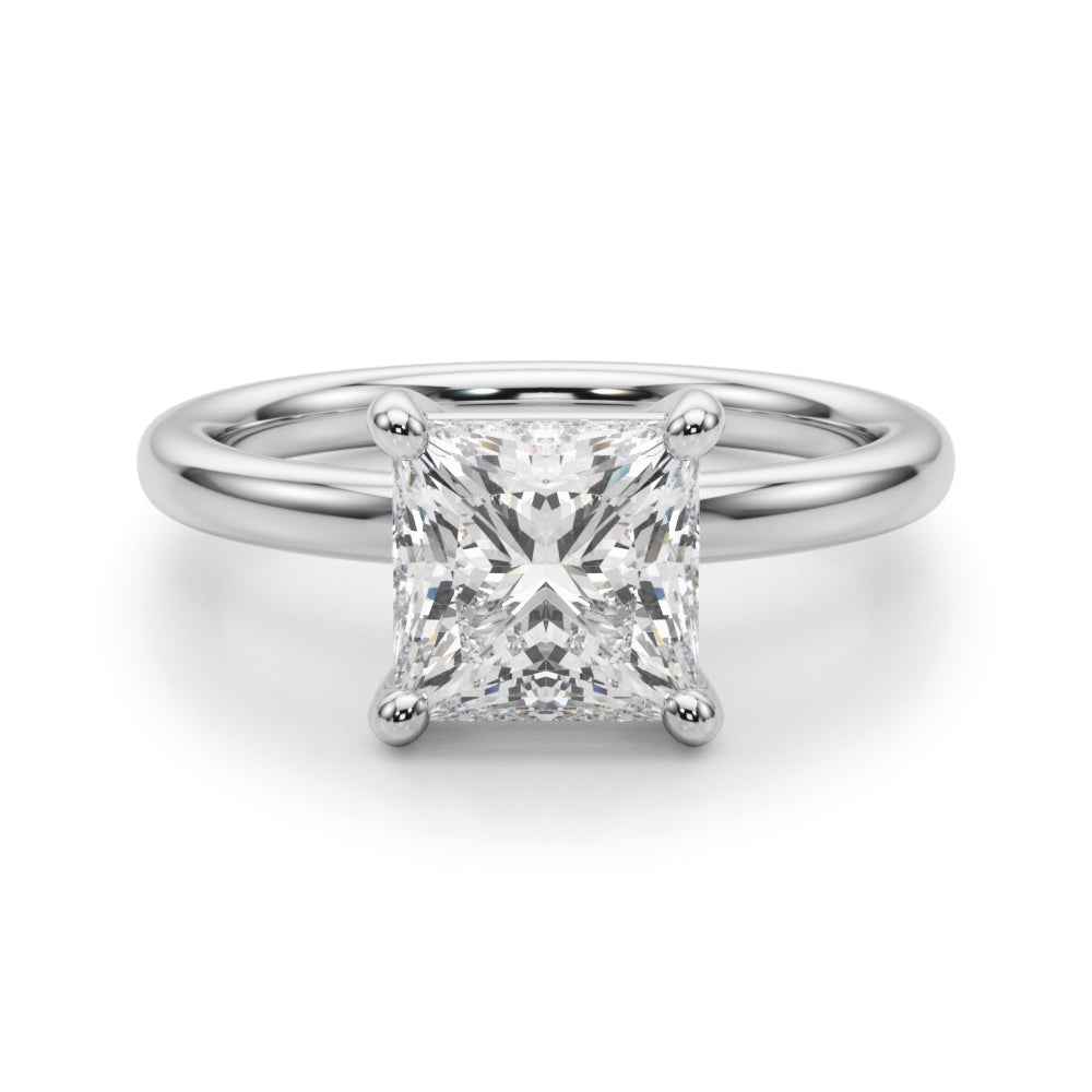 Sleek 4-prong profile display of a princess cut lab grown diamond solitaire ring in 14K white gold.