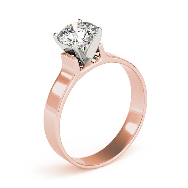 Modern flat wide shank diamond solitaire ring crafted in lustrous 14K rose gold.