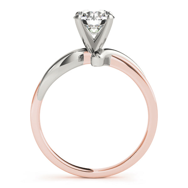 Side profile of a round diamond tension-style solitaire ring in 14K rose and white gold.