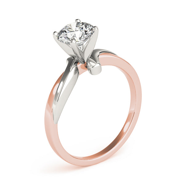 Modern vertical view of a round diamond crossover wave engagement ring in 14K white and rose gold.