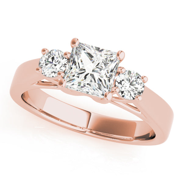 Princess round cut lab-grown diamond three stone ring in 14K rose gold.