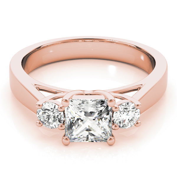 Classic Princess round lab-grown diamond three stone ring with prong setting.