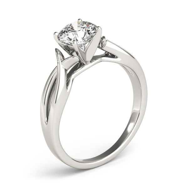 Elegant tilted presentation of white gold fluid wave diamond ring for contemporary brides
