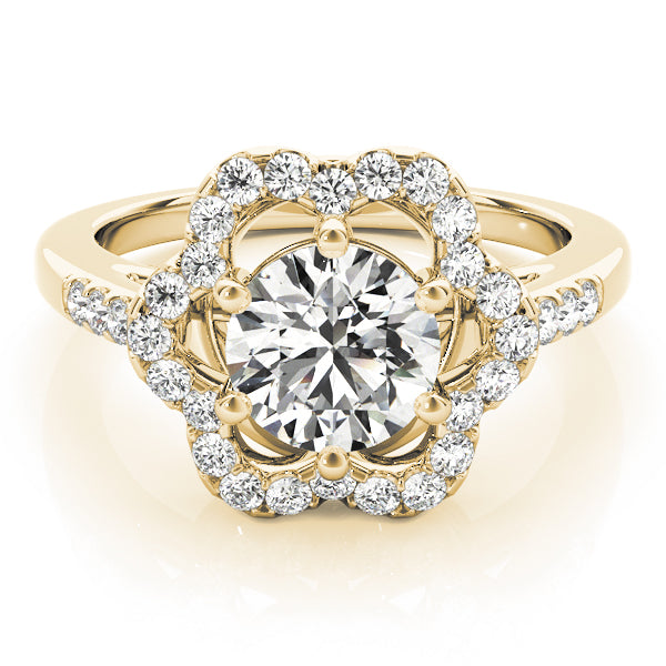 Top-down studio shot of a 14k yellow gold floral engagement ring
