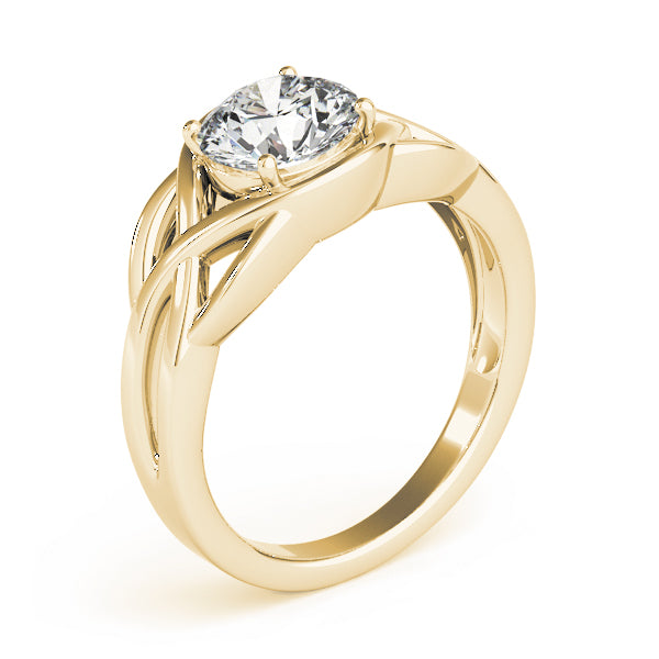 Three-quarter view of 14k yellow gold ring highlighting the detailed celtic weave.