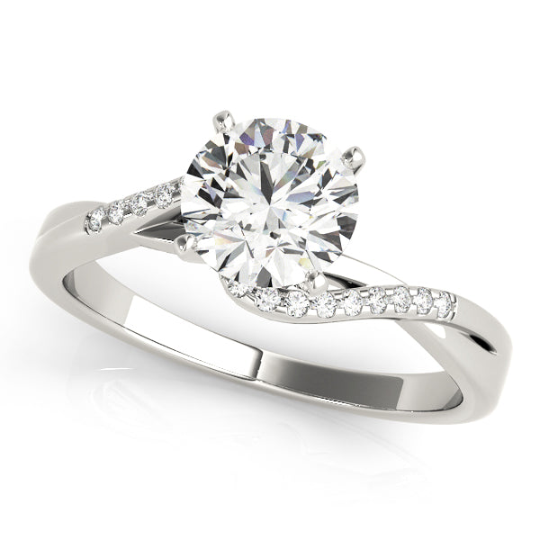 Angled shot of a white gold S-curve bypass diamond ring