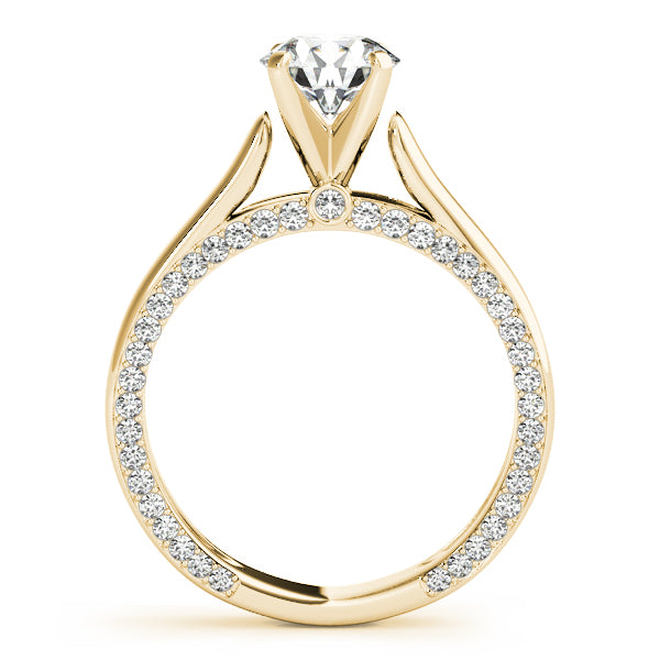 Direct side view showing the cathedral arch and hidden pavé border of a yellow gold ring.