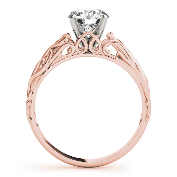 Side view of a rose gold vintage filigree diamond ring