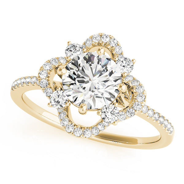 Angled studio shot of a 14k yellow gold round cut diamond ring