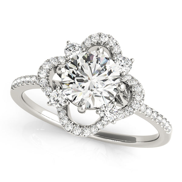 Top-angle view of a white gold vintage-inspired petal halo ring