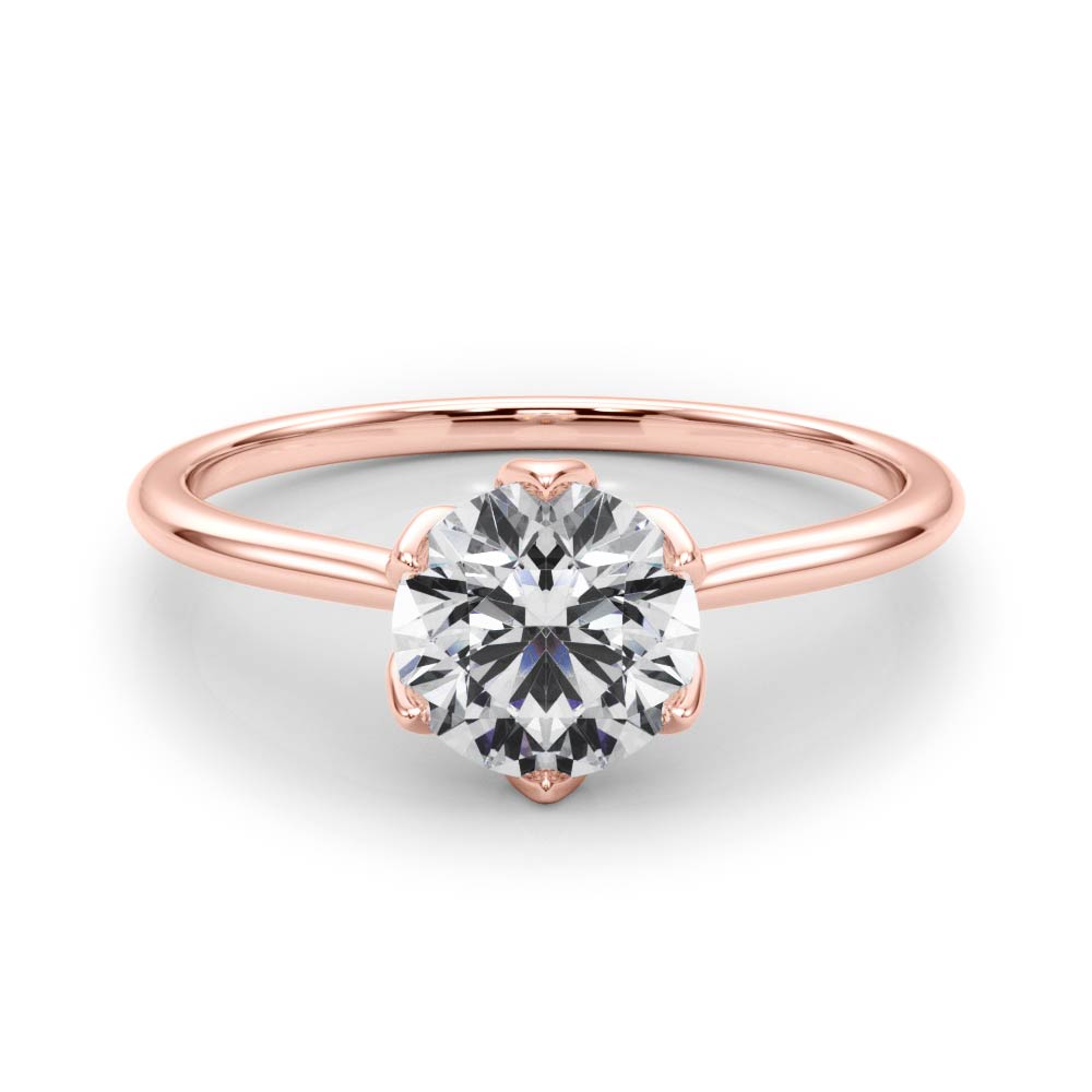 14K gold ring top view highlighting the intricate petal design under the prongs