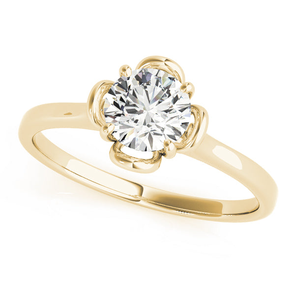 VS F lab grown diamond solitaire ring in 14K yellow gold with a decorative prong setting.