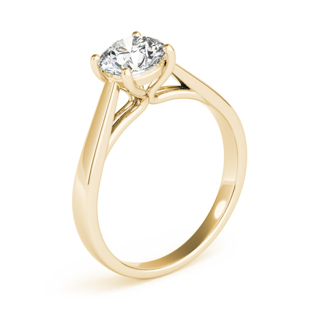 Perspective angle view of a yellow gold lab grown diamond engagement ring.