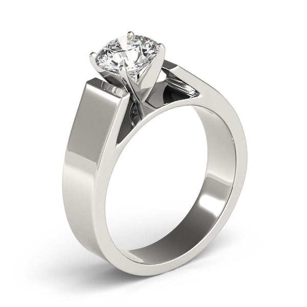 Side profile of a white gold lab-grown diamond engagement ring showing the elegant cathedral prong setting and bold band design.