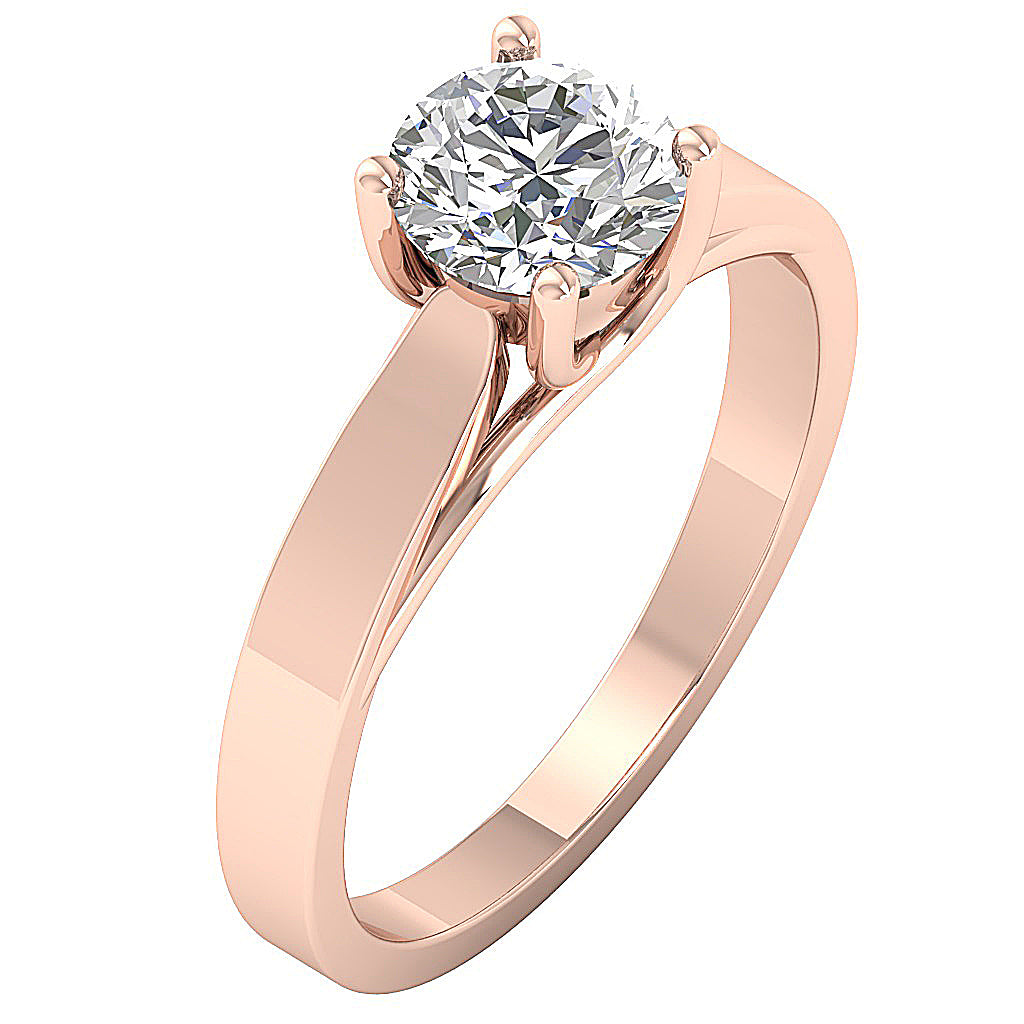 Blushing rose gold 4-prong engagement ring for a modern bride