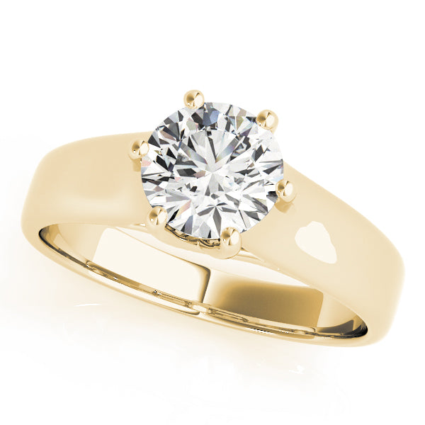 Top-down angle of a 14K yellow gold engagement ring with a brilliant round VS-F lab diamond.