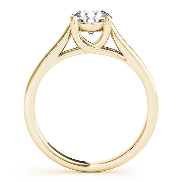 Beautiful side view of the yellow gold ring highlighting the intertwined metal work of the prong base.