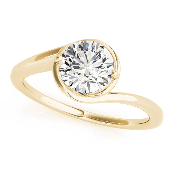 Top-down view of the 14K yellow gold variation showing the unique dual-prong placement on a round diamond.