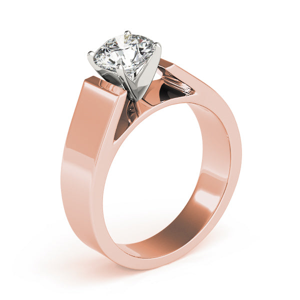 A 1.25 carat round brilliant cut lab-grown diamond set on a bold 14K rose gold band with a high-polish finish.