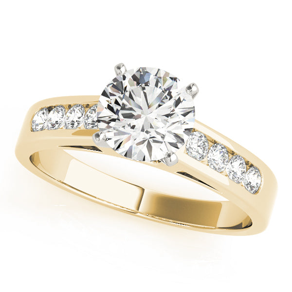 Angled front view of round brilliant cut lab grown diamond engagement ring in yellow gold